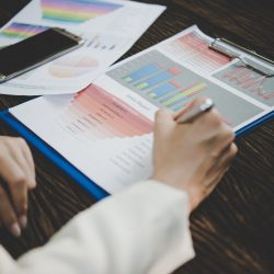 Business woman working with analysis marketing document . Business woman working with analysis marketing document .